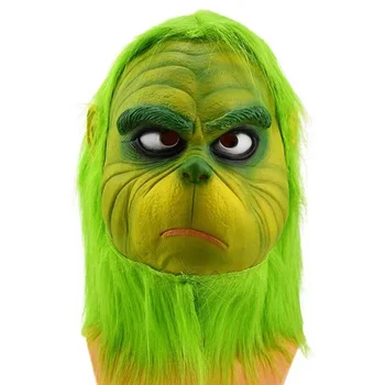 Коледно маска парти като латексова глава и зелена космата маска за Хелоуин